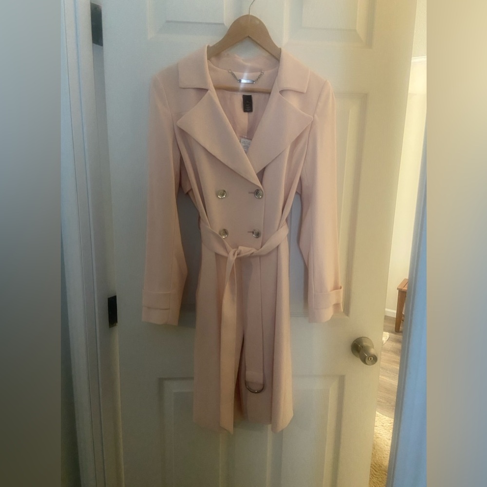WHBM light pink brand new trench coat. Approximately 36 inches long.